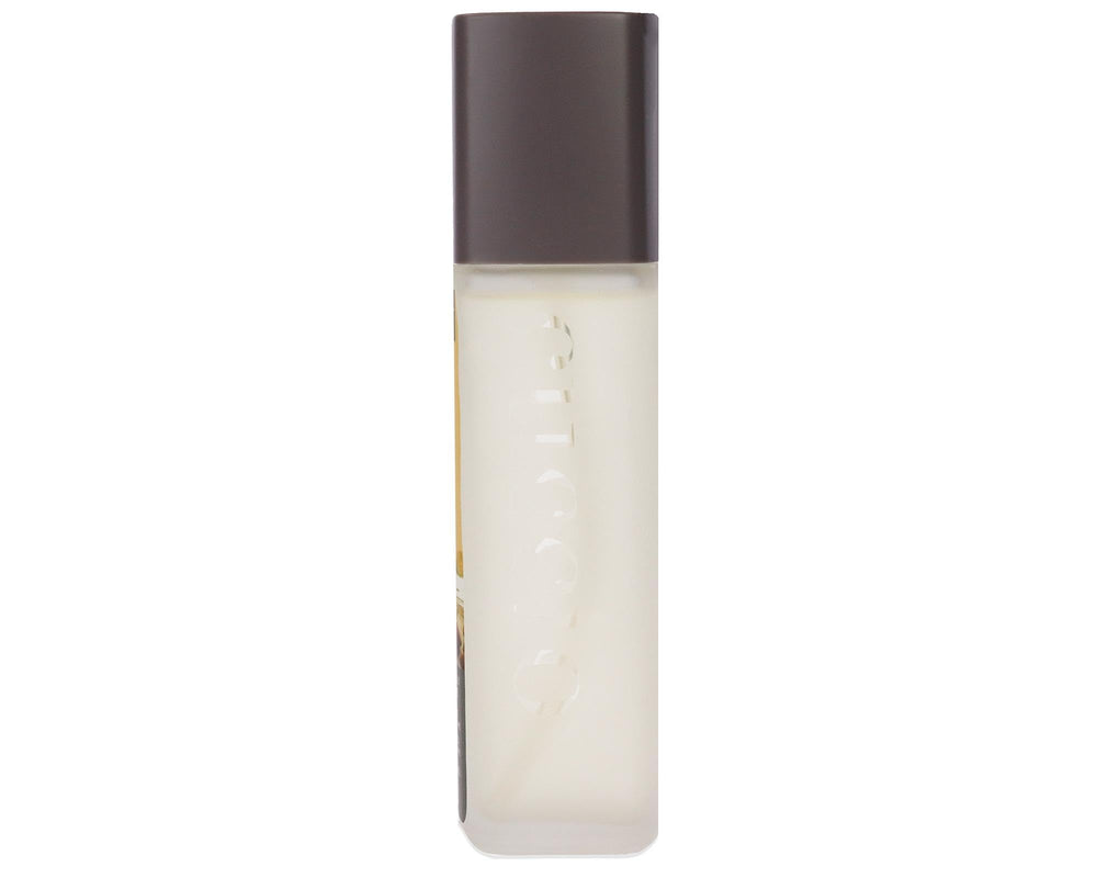 Cuccio oil applied to hand demonstrating quick absorption and silky finish