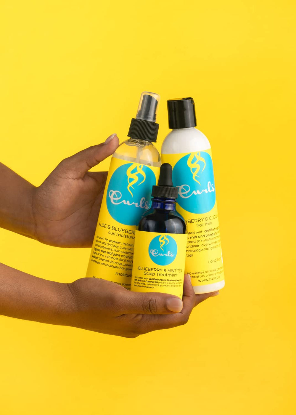 Curls Blueberry Bliss used on curly hair to reduce frizz and define