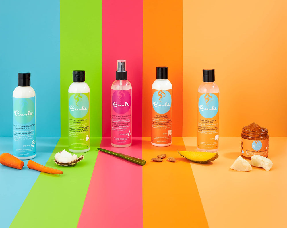 Curls Lavish Moisturizer beside a hand showing 8 fl oz scale