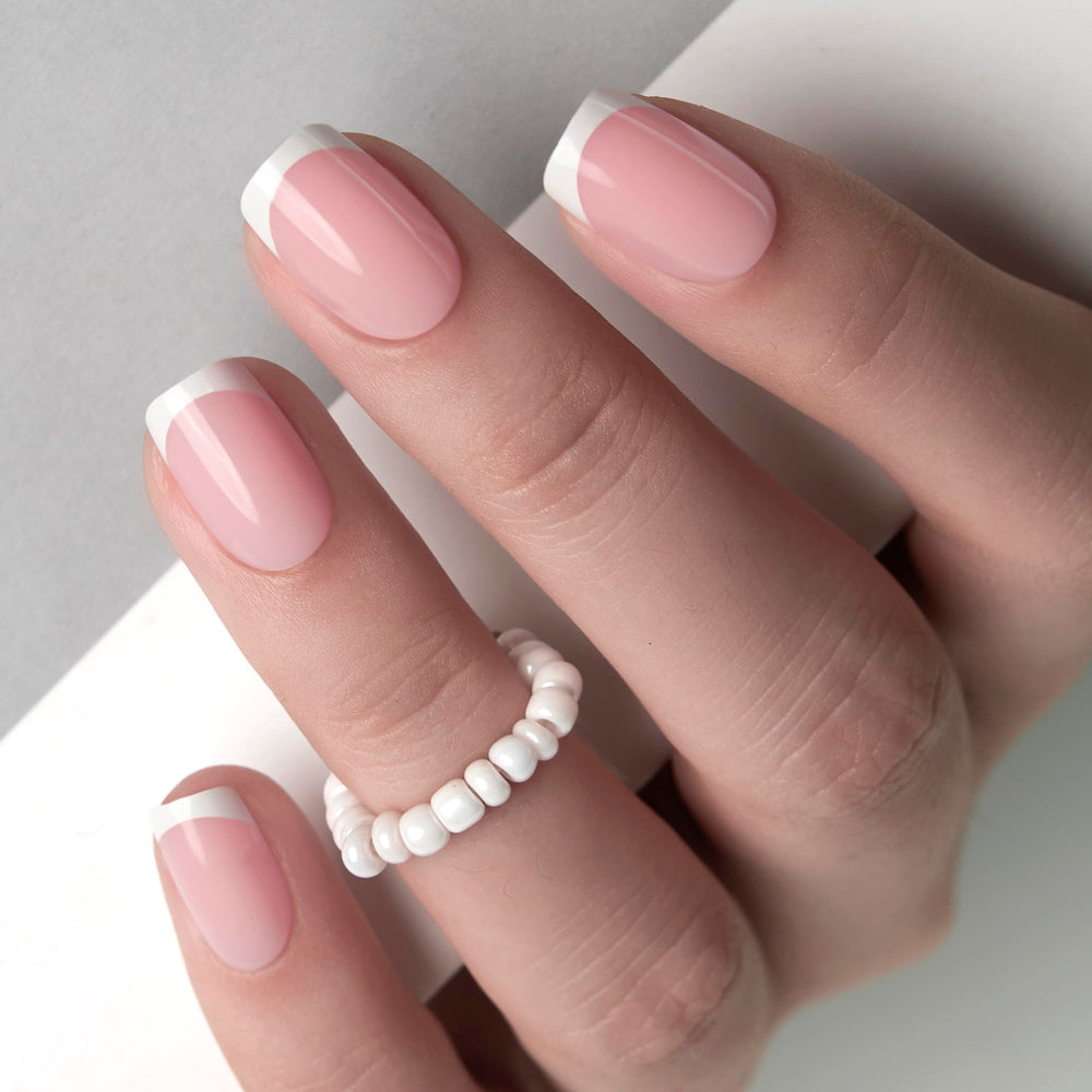 Curvlife close-up of handmade gel French tip detail showing salon-quality finish benefit