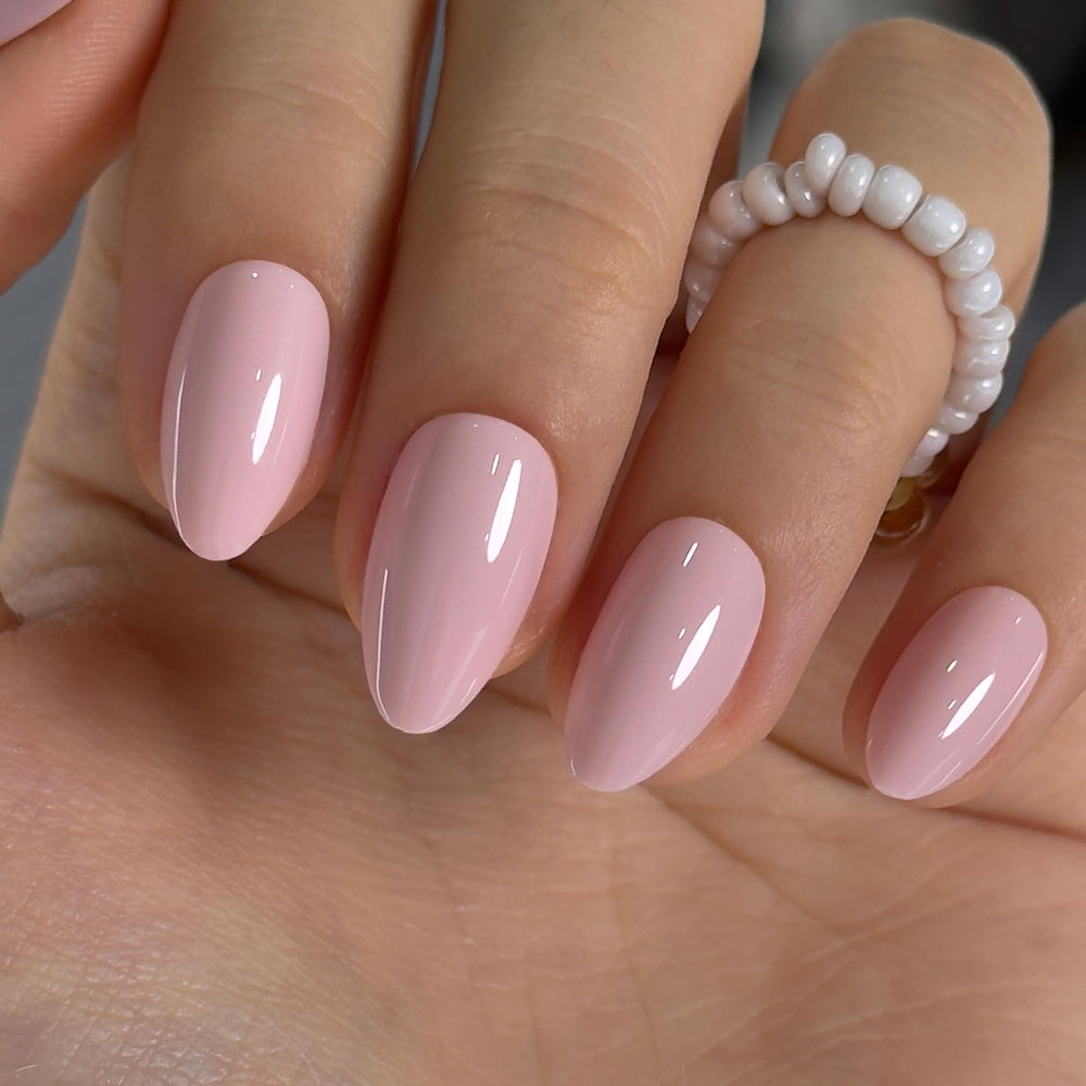 Curvlife front packaging showing medium almond pink press-on nails and kit contents for convenience