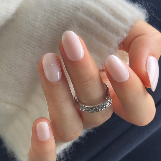 CurvLife front packaging showing short oval press on nails and kit for instant salon look
