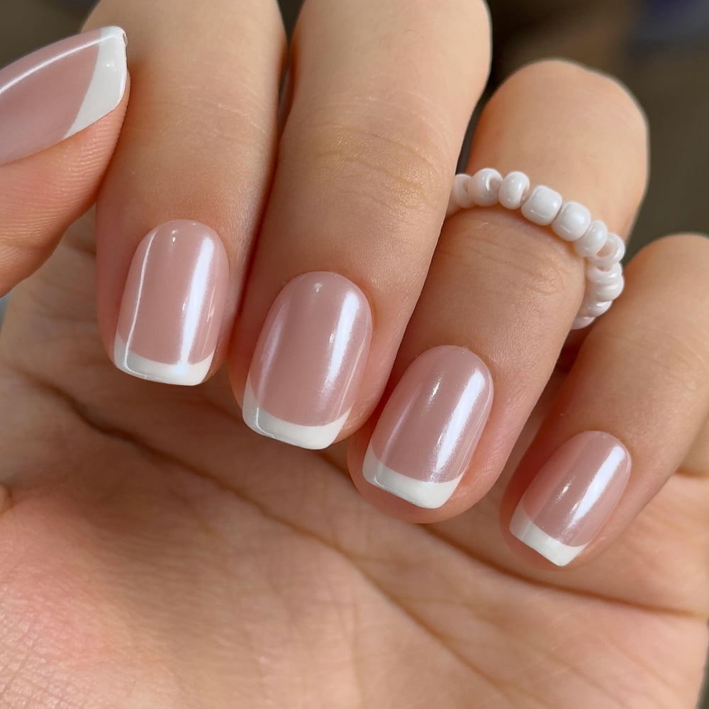 Curvlife front packaging showing short square pearl French nails and quick salon finish