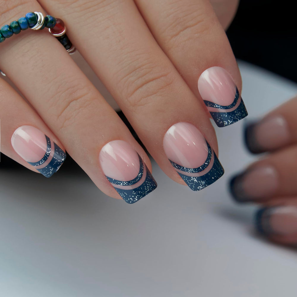 CurvLife hands applying a press-on nail quickly to show easy five-minute application