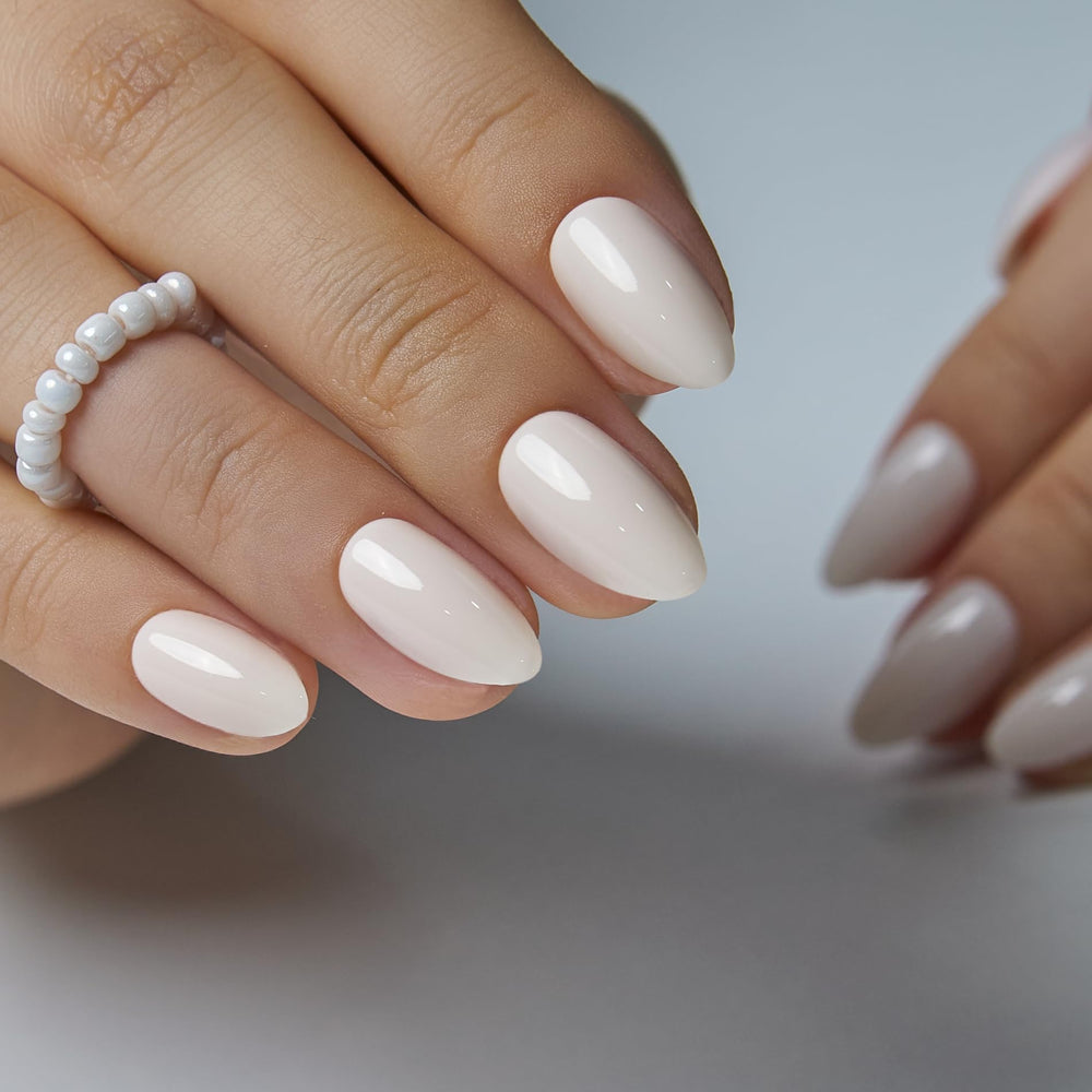 Curvlife nails being applied with included glue demonstrating secure hold