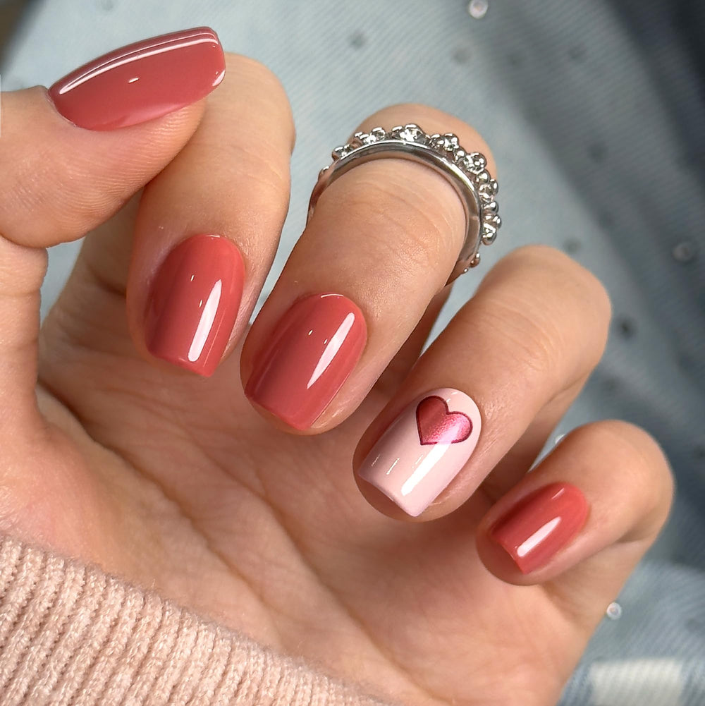 CurvLife nails in hand demonstrating short square size and natural fit benefit