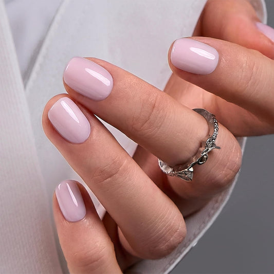 CurvLife Ivory Kiss front packaging showing glossy square nails and included kit benefits