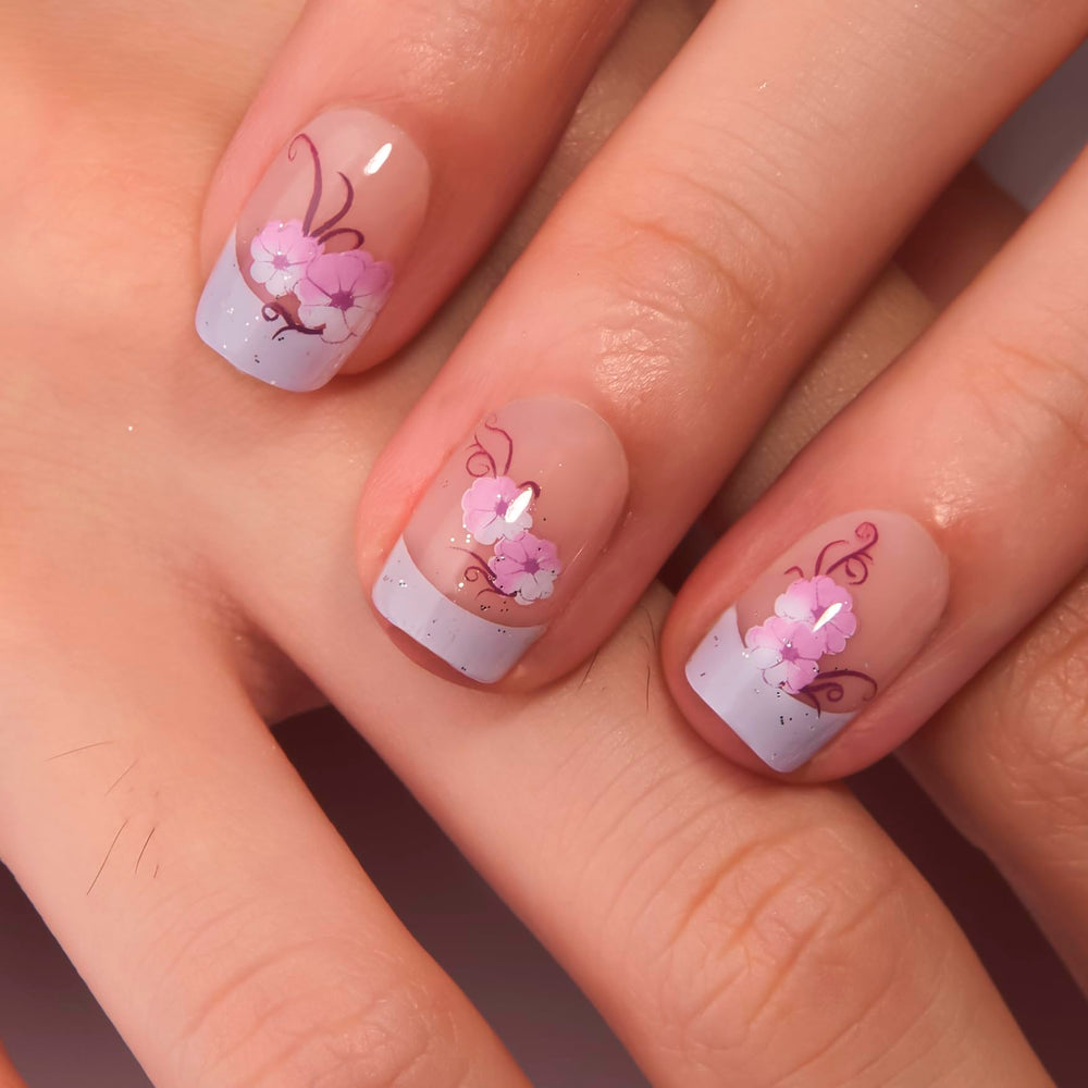 CurvLife close-up of nail surface and purple floral detail highlighting smooth gel finish and realism