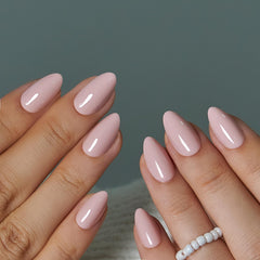 Curvlife nail set laid out with glue, tabs, file and cuticle stick for complete at-home application