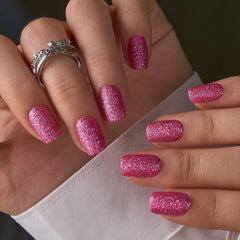CurvLife nails in hand during application illustrating fast at-home manicure