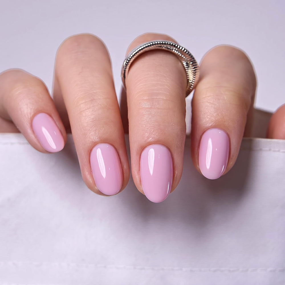 CurvLife nails being applied by hand demonstrating easy at-home salon-quality results
