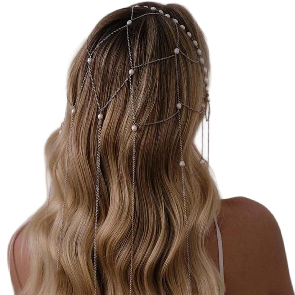 Cusmyre close-up pearl tassel detail showing refined shine