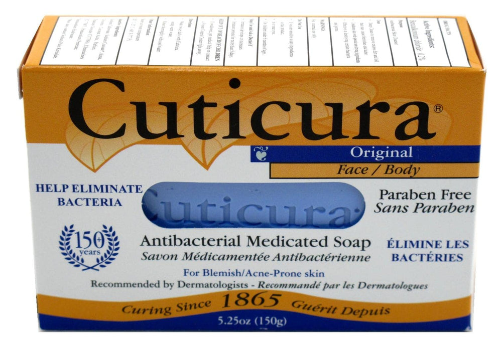 Hand holding Cuticura bar showing 5.25 oz size and easy grip benefit