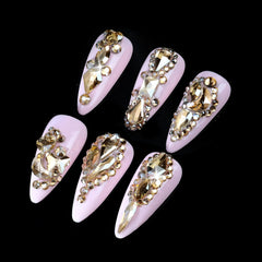 Cycullinyt arranged 3D shapes display illustrating variety for creative nail designs