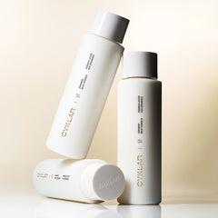 Bathroom shelf with CYKLAR bottle conveying daily self-care routine benefit