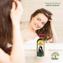 bathroom shelf with Dabur Maha Bhringraj oil showing everyday routine integration
