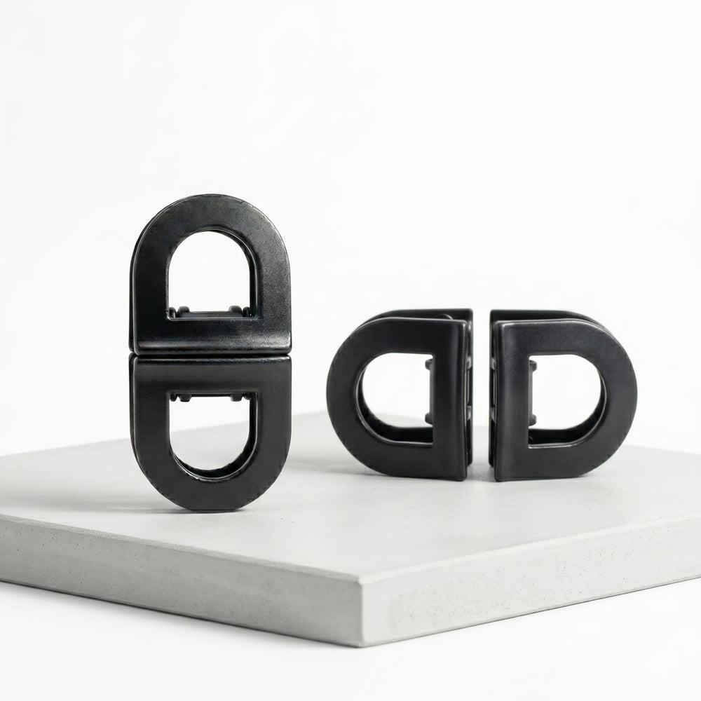 DAFNI KLIX front packaging showing matt black clips and secure branding benefit