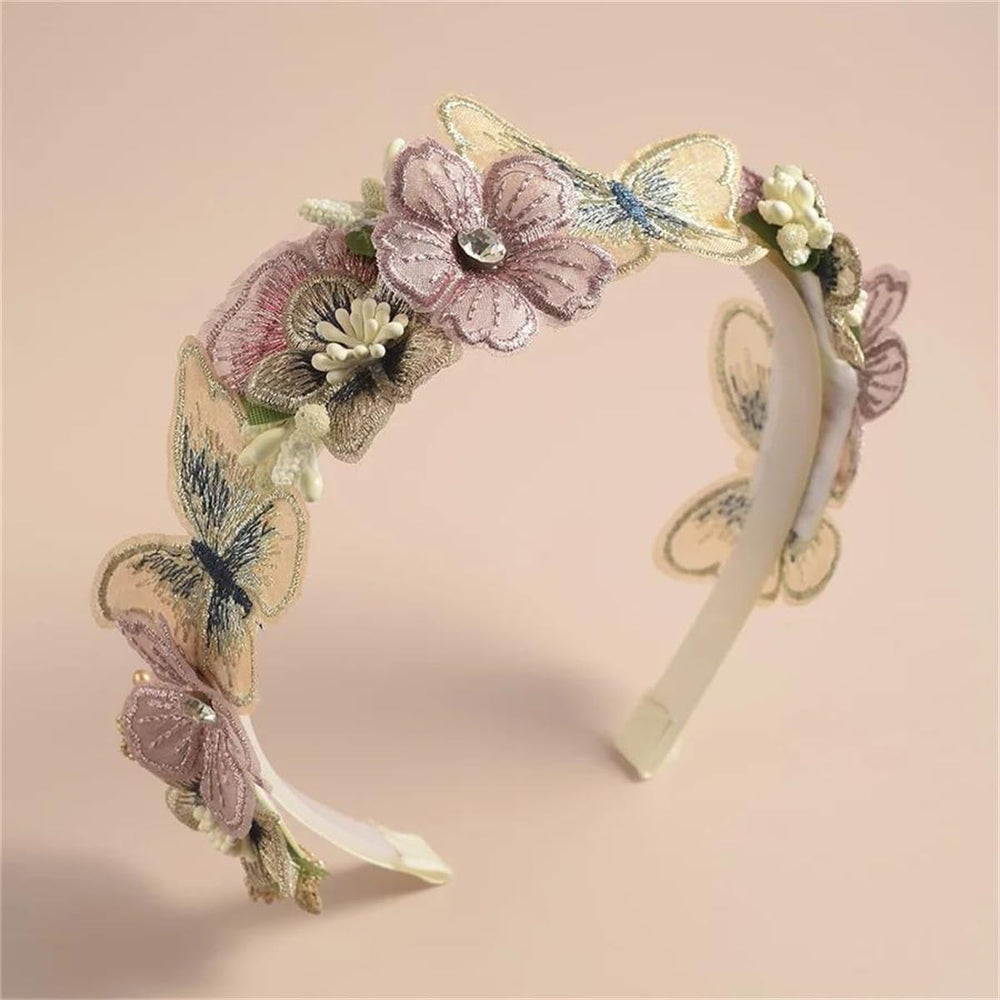 DANRENPANG front view pink headband showing floral arrangement and elegant styling benefit