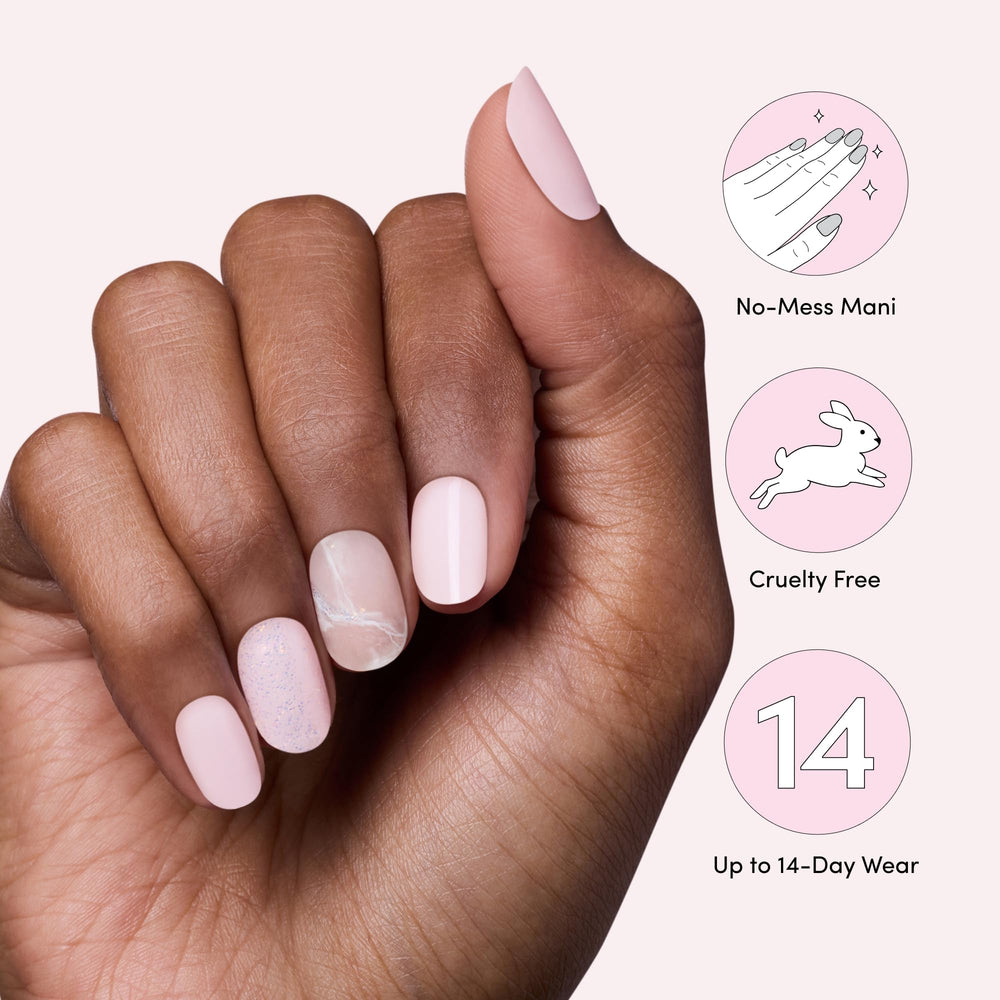 Hands wearing Dashing Diva strips in lifestyle scene showing polished look benefit