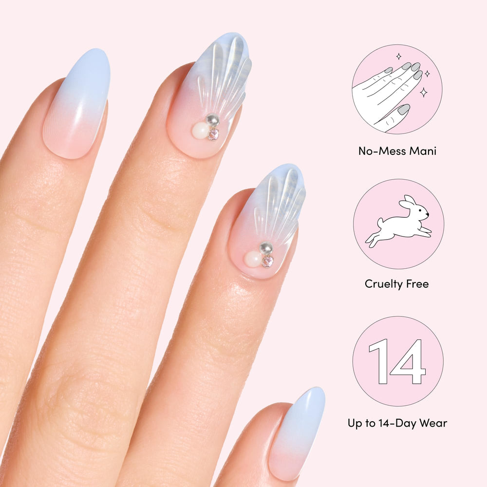 Dashing Diva press-on nails worn outdoors conveying summery, photo-ready look