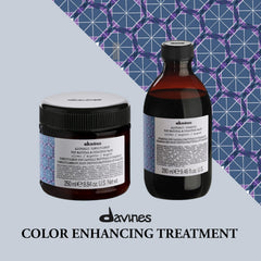 Davines purple cream on a hair strand demonstrating toning and conditioning effect