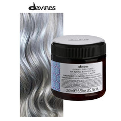 Davines open cap revealing purple cream texture and easy application benefit