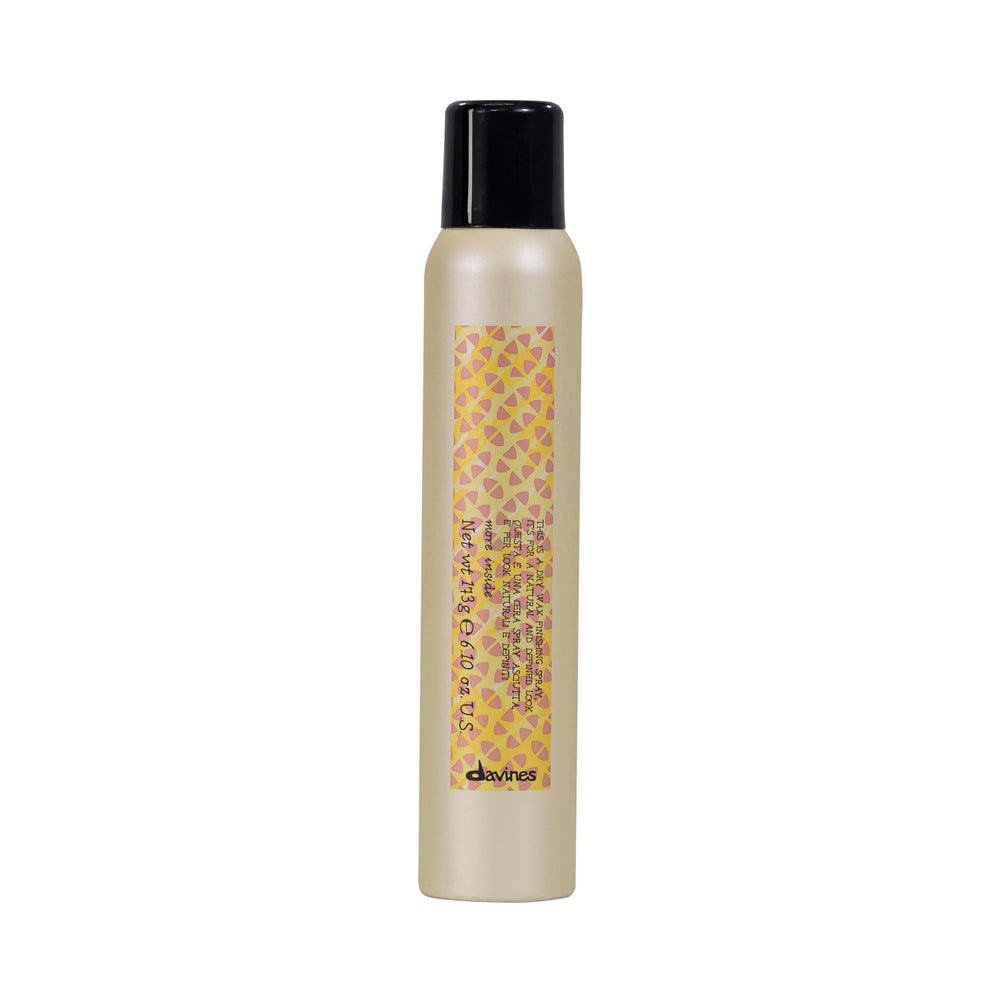 Davines front packaging of dry wax spray showing product benefits