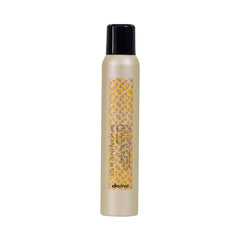 Davines front packaging of dry wax spray showing product benefits