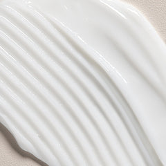 Davines LOVE CURL conditioner bottles in bathroom lifestyle scene suggesting routine benefit