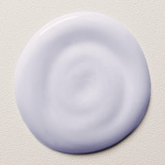 Davines serum texture on hand highlighting creamy absorbent formula benefits