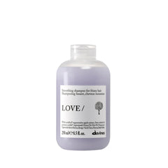 Davines front bottle showing LOVE Smoothing Shampoo benefits and design