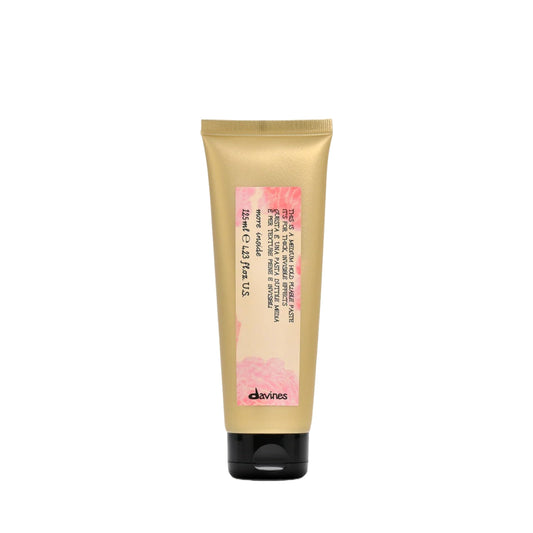 Davines front packaging showing medium-hold paste and clean branding benefit: clear product identity
