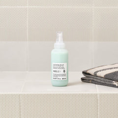 Davines MELU serum label and ingredients view emphasizing natural active components