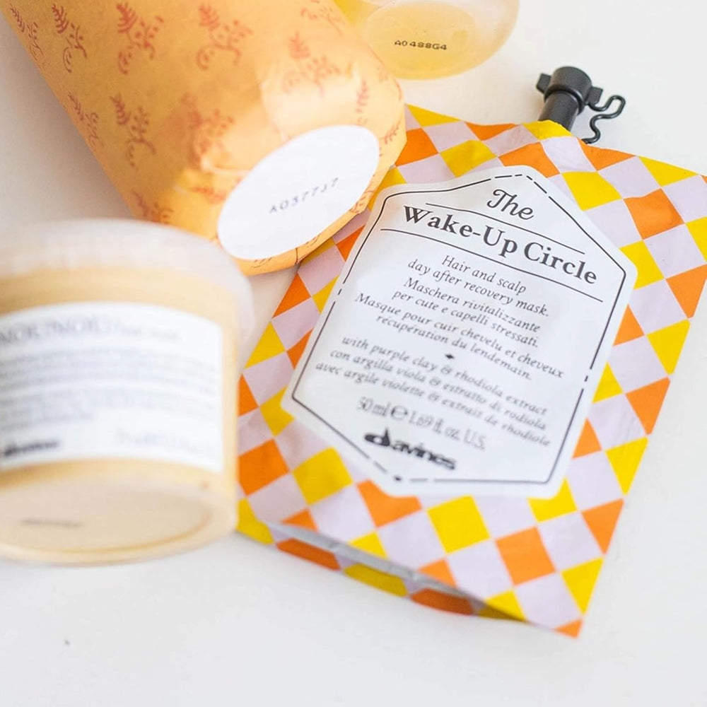 Davines Wake-Up Circle rinsing from hair showing clean rinse and lightweight finish
