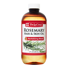 De La Cruz front bottle showing rosemary oil blend and volume benefits