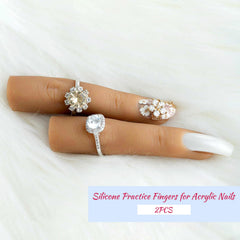Deciniee studio display with rings and polish showcasing the finger as a jewelry and photo prop