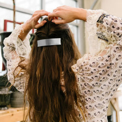 DED hair clip in use securing a half-up hairstyle for a tidy everyday look
