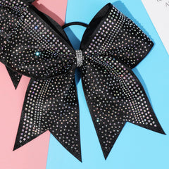 DEEKA bow worn in a ponytail on model demonstrating visible performance impact
