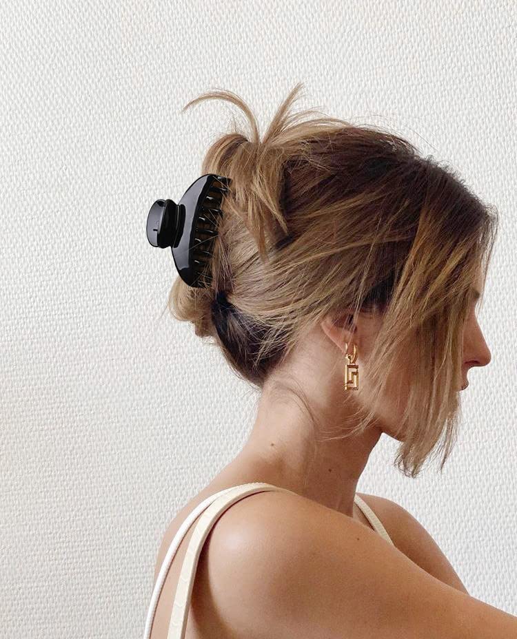DEEKA clip holding half bun hairstyle for quick everyday convenience