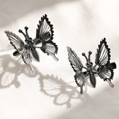 DEEKA butterfly clip attached to hat adding instant glam