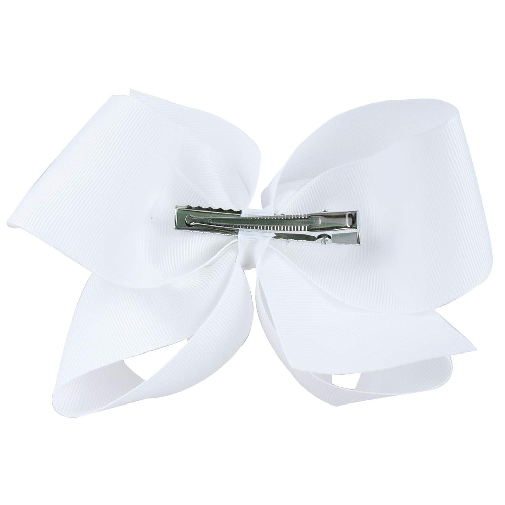 DEEKA bow beside a hand for scale showing true 4-inch size benefit for styling