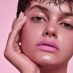 Depuplum texture close-up showing smooth sheer gloss for hydrated look