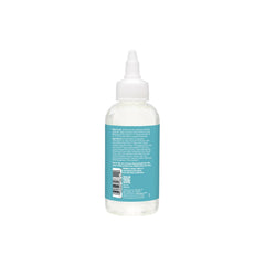 Rinse on bathroom counter styled with towel showing at-home routine benefit effortless use