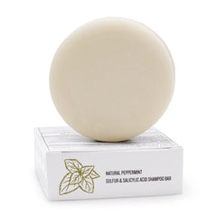 Dermaharmony 4 oz bar next to coin for scale showing long-lasting benefit