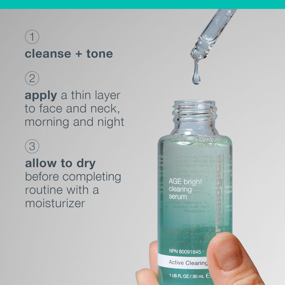 Dermalogica serum being applied to cheek in mirror for targeted blemish care
