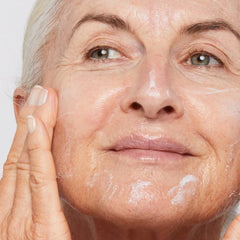 Dermalogica Super Rich Repair applied by fingers to demonstrate smoothing and barrier support