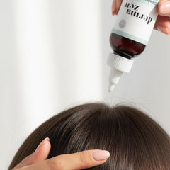 Dermazen serum being applied to scalp to calm flakes and reduce itch