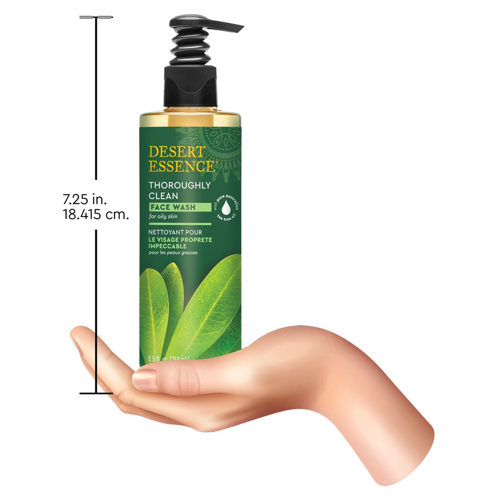 Desert Essence bottle on bathroom shelf in lifestyle setting suggesting daily use