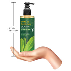 Desert Essence bottle on bathroom shelf in lifestyle setting suggesting daily use