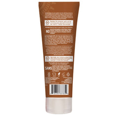 Desert Essence dollop on hand demonstrating creamy texture and easy spread benefit